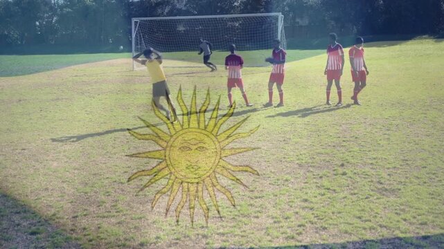 Soccer kicker taking freekick striking ball to score wall blocking GK sliding sun-shaped overlaying