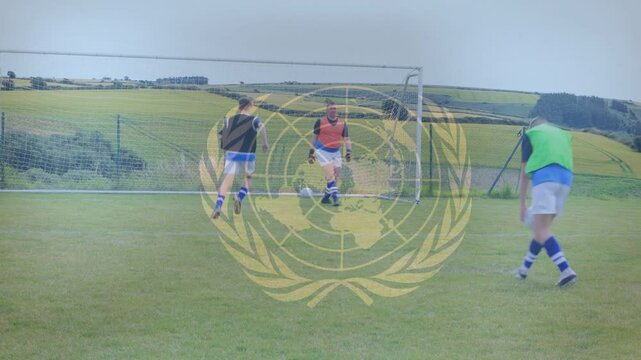 Kicker taking run shooting ball keeper diving saving mate getting for soccer drill logo overlaying