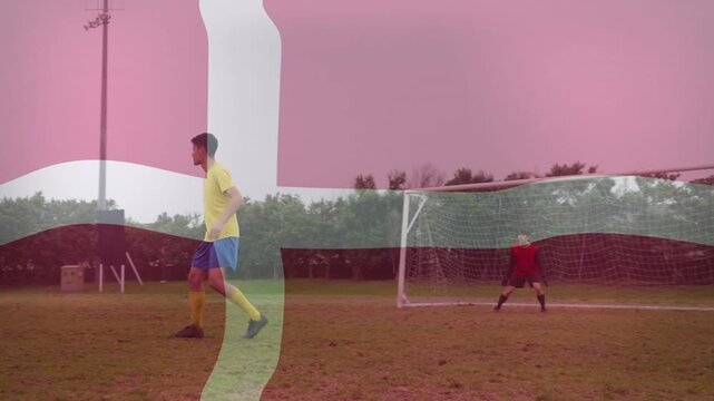Football striker advancing, defender shifting to mark, ball rebounding near goal under pink flag