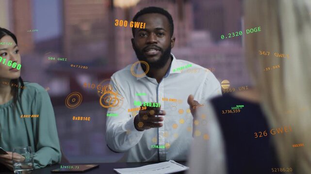 Male speaker tapping pen while speaking, animating finance charts over papers to prompt team input