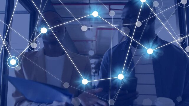 As woman pointing blue folder, man checking phone, animated net pulsing visualizing business data