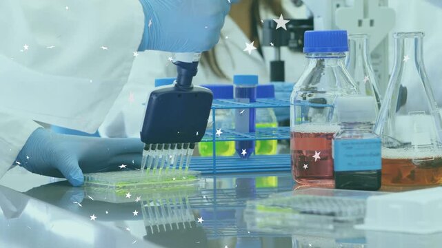 Lab tech lowering 8ch pipette press, filling 96w plate for assay with fluor dye star-overlay moving