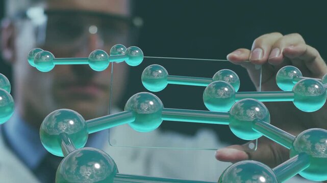 Holding clear panel scientist studying cyan molecule rotating, pointing inner cluster for research