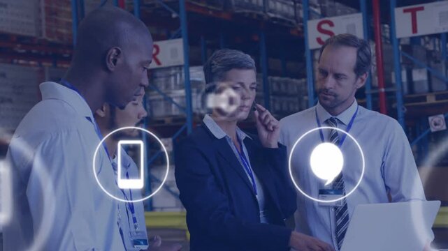 Team lead typing laptop in depot icons appearing rearranging fading over group while deciding stock