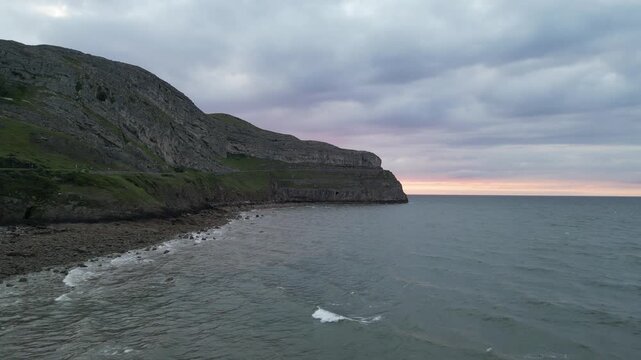Sunset over Great Orme cliffs in Wales