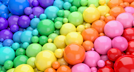 Obraz premium A captivating visual symphony of glossy, multicolored 3D spheres, meticulously arranged in a dynamic, gradient flow, creating a vibrant abstract background texture