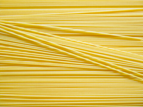 Dried capellini spaghetti pattern background