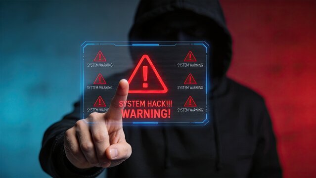 Hooded hacker touching futuristic holographic system hack warning interface, cyber security threat concept with red alert signs and digital technology background, data breach and