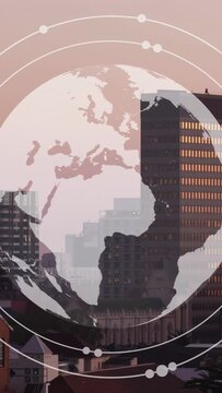 Vertical video: On load globe turning east while rings circling, showing map over city for network