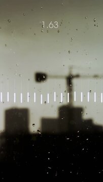Vertical video: Rainy window showing bars pulsing and red line reacting to audio, settling values