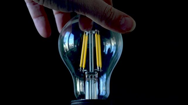 Screwing Bulb, Turn On the Light View, Turning the Light On a Led Bulb, Turns the Light Off in Town, Pull Switch On Off, Electricity Concept, Global Warming Crises