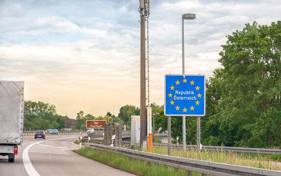 Road sign of Austria on highway border with European Union symbol, travel and transportation concept, crossing into EU country with different traffic rules and speed regulations.