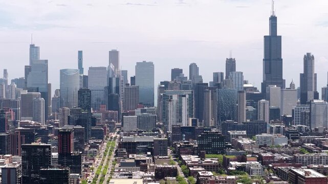 Aerial view of Chicago skyline featuring Willis Tower and dense urban downtown architecture in Illinois.