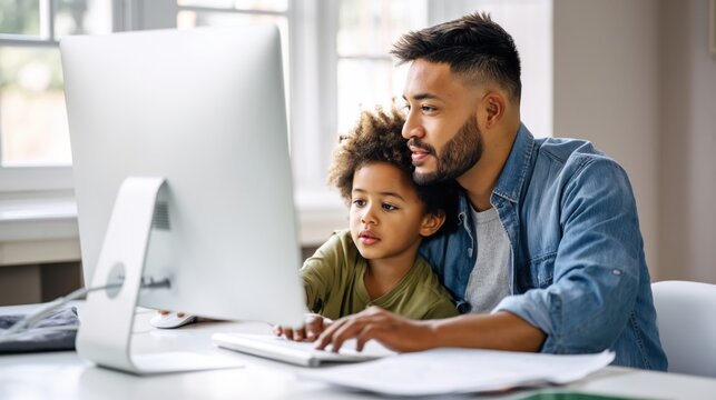 Parent and child using desktop computer together at home office, learning and bonding in a bright modern interior.