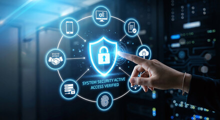 Fototapeta premium A hand interacts with a glowing futuristic holographic digital security interface overlay in a professional server room setting