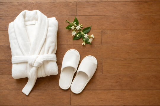 Serene spa essentials on warm teak floor