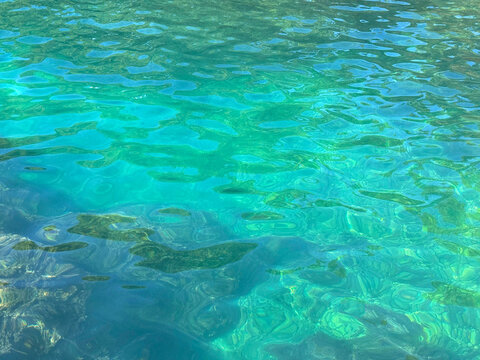Emerald clear sea water surface