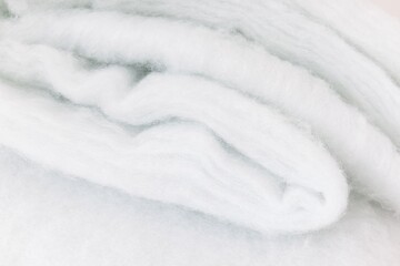 White Synthetic Padding Layer. Soft Polyester Batting Fiber Textile and Fabric Texture. © NBLX