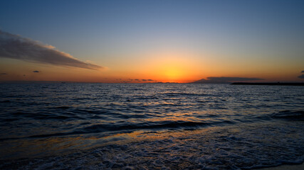 Fototapeta premium Sunset Over Ocean Horizon