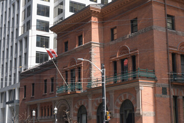 Fototapeta premium exterior facade of Toronto Club clubhouse, designed by Darling and Curry (1889) with additions by Darling and Pearson (1912), located at 107 Wellington St W, Toronto