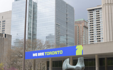 Fototapeta premium FIFA World Cup 2026 tournament branding or host city dressing at Toronto City Hall podium (behind, Ontario Court of Justice)