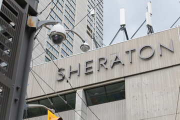 Fototapeta premium exterior building and sign of Sheraton Centre Toronto Hotel located at 123 Queen St (shown here northeast corner of York St and Richmond St W)