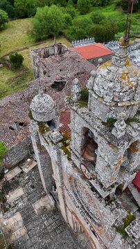 Drone flying over the damaged roof of Santa Marina de Augas Santas