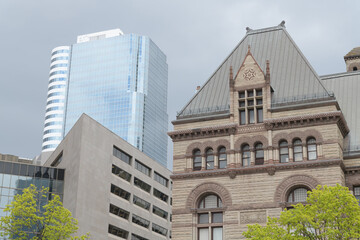 Fototapeta premium exterior of CF Toronto Eaton Centre tower, (below) 483 Bay St, and Old City Hall, designed by Edward James Lennox, 60 Queen St W, Toronto