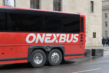 Fototapeta premium Onexbus, a long-distance coach service outside York St entrance to Fairmont Royal York hotel, Toronto