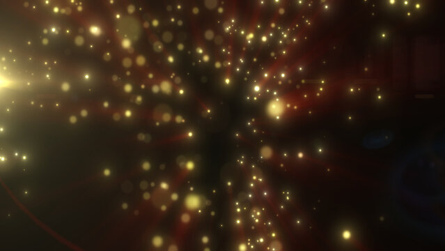 Golden glowing particles floating in dark space with warm red tones, soft bokeh, and dramatic light burst