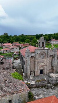 Stone facade and bell tower of Santa Marina de Augas Santas church