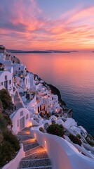 Obraz premium Sunrise over Santorini Greece with glowing cliffside buildings and calm sea views, ideal for social media landing pages
