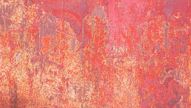 Distressed red painted metal surface with rust and peeling texture