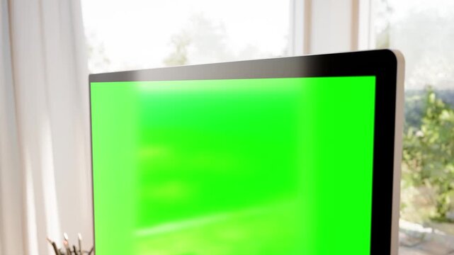 Computer Monitor Green Screen Mockup Close-Up &ndash; Upper Display Reveal in Scandinavian Home Office