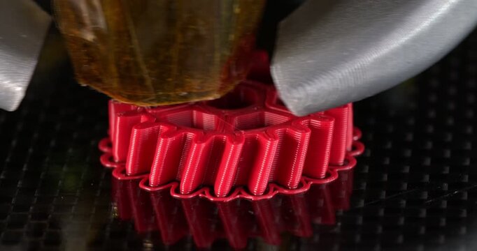 Gear 3D printing process. Printing on a сartesian kinematics printer. Close-up footage 4k.