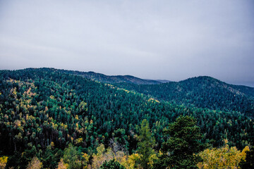Obraz premium Landscape of snowy Siberia Krasnoyarsk mountains, mountain range in haze summer