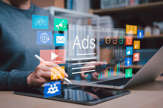 Digital advertising analytics concept. Marketer using laptop to manage online ads, social media campaigns, email marketing, audience targeting, performance charts, conversion data for business growth,