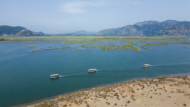 Iztuzu Beach, Turkey - May 9, 2026: Aerial drone view of Iztuzu Beach near Dalyan, Muğla Province, Turkey, showing the sandy coastline, turquoise Mediterranean Sea, Dalyan river