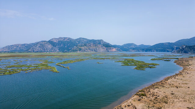 Iztuzu Beach, Turkey - May 9, 2026: Aerial drone view of Iztuzu Beach near Dalyan, Muğla Province, Turkey, showing the sandy coastline, turquoise Mediterranean Sea, Dalyan river
