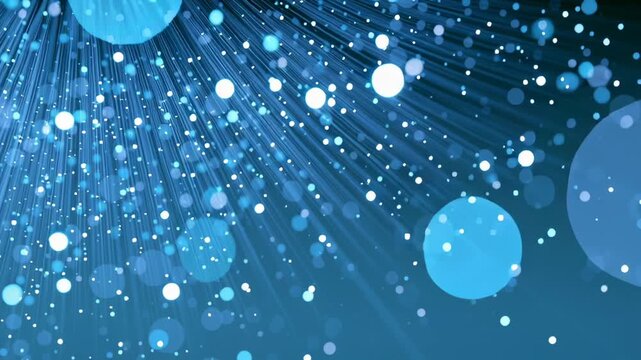 Abstract background featuring glowing blue particles and light lines radiating from the top corner, creating a dynamic visual of light effects, digital data flow, and modern technology