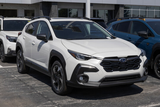 Subaru Crosstrek Limited Compact SUV at a dealership. Subaru offers the Crosstrek with a 2.5L DOHC BOXER engine. MY:2026