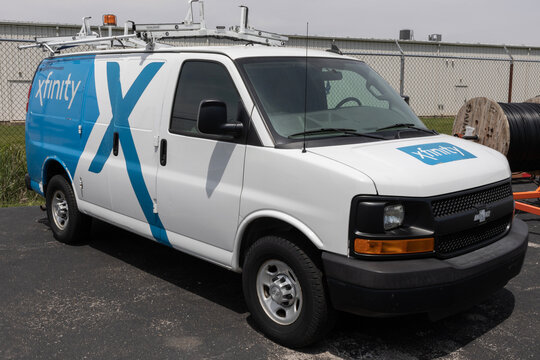 Xfinity branded Comcast work van. Comcast owns NBCUniversal, Xfinity Internet and DreamWorks Animation.
