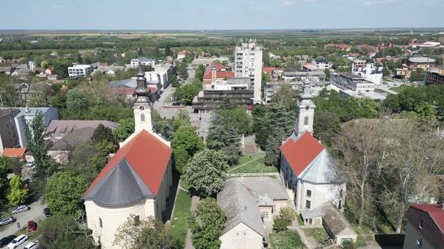 Aerial shot flying forward over the main streets and buildings of Vrbas, northern Serbia.