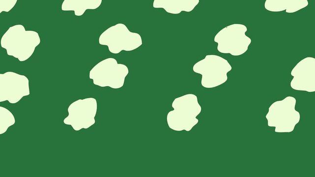 A green background with white dots and cow pattern an image of border frame hearts on it green screen animated chromakey background expression layers figure creative movement composition