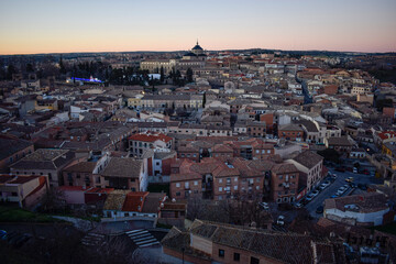Fototapeta premium Sunset Panorama of Toledo’s Historic Rooftops