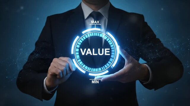 Businessman holding a glowing circular interface displaying the word VALUE with min and max indicators