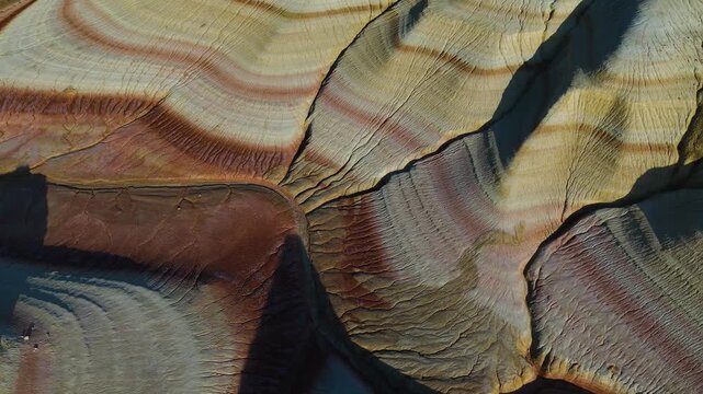Kyzylkup is a natural landmark in the Mangystau region of Kazakhstan. It is a group of colorful hills with multicolored layered slopes that resemble the Italian dessert tiramisu