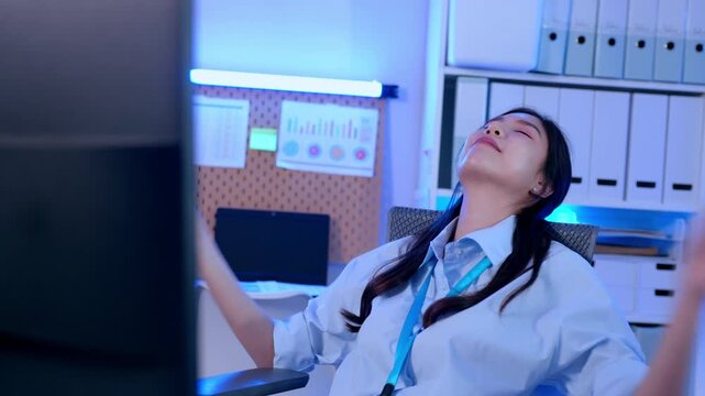 Office woman tired burnout stress overtime night computer desk employee customer support call center headset workstation, fatigue and workplace pressure during late shift, resting eyes closed after