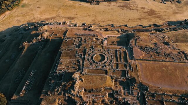 Aerial view of Sacsayhuam&aacute;n, an ancient Inca archaeological site overlooking Cusco, Peru. Massive stone walls and terraces highlight the engineering of the Inca civilization.