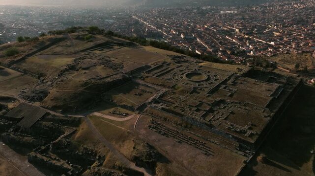Aerial view of Sacsayhuam&aacute;n, an ancient Inca archaeological site overlooking Cusco, Peru. Massive stone walls and terraces highlight the engineering of the Inca civilization.